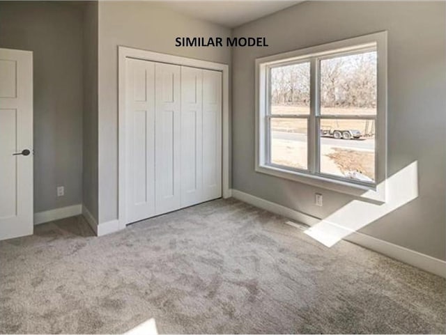 6643 Royal View Dr, Deforest, WI 53532 - unfurnished bedroom with baseboards and carpet