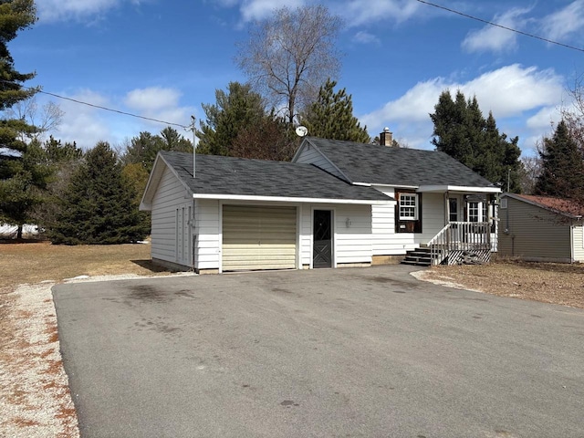 1006 Lulu Ave, Crivitz, WI 54114 - single story home featuring driveway, an attached garage, and a chimney