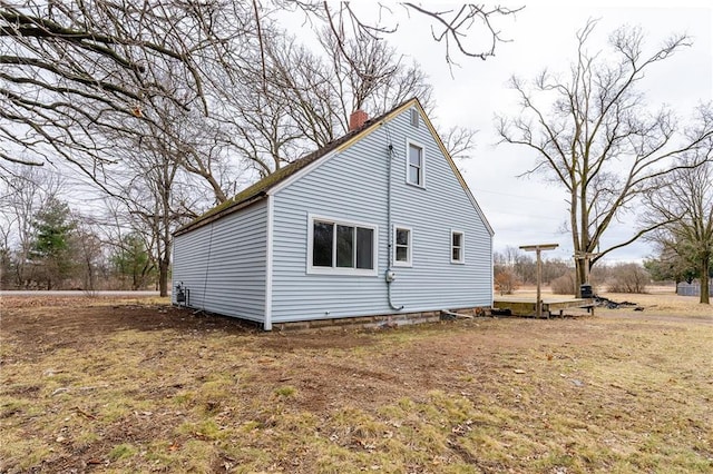 3202 120th St, Chippewa Falls, WI 54729 - view of property exterior with a chimney