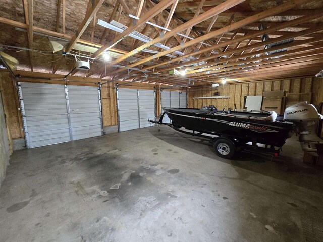 N10444 N Horseshoe Rd, Tomahawk, WI 54487 - garage featuring a garage door opener