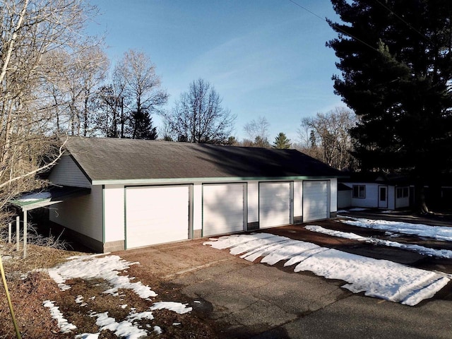 N10444 N Horseshoe Rd, Tomahawk, WI 54487 - snow covered garage with a garage