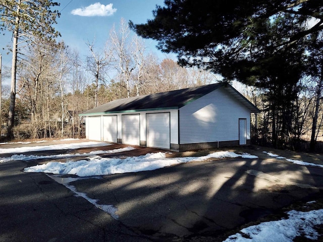 N10444 N Horseshoe Rd, Tomahawk, WI 54487 - view of snow covered garage