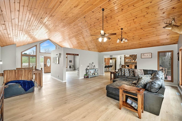 W590 Kearney Rd, Burlington, WI 53105 - living room featuring baseboards, light wood-style flooring, a ceiling fan, high vaulted ceiling, and wood ceiling
