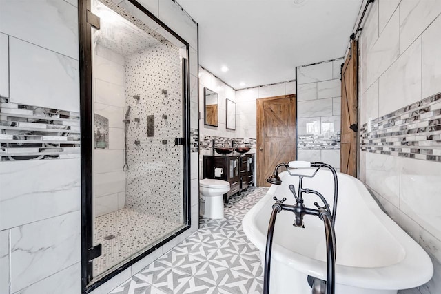 3237 Mill Rd, Greenleaf, WI 54126 - full bath featuring tile walls, a soaking tub, a shower stall, tile patterned floors, and vanity