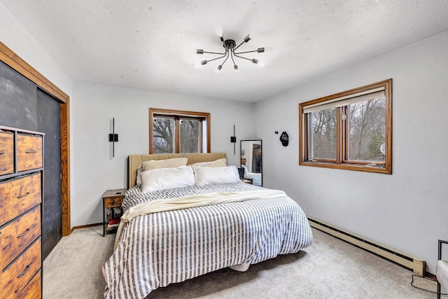 3237 Mill Rd, Greenleaf, WI 54126 - carpeted bedroom with a baseboard radiator, baseboards, and multiple windows