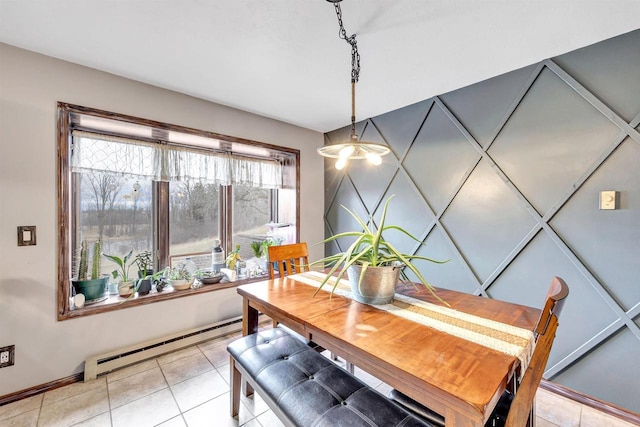 3237 Mill Rd, Greenleaf, WI 54126 - dining room featuring a baseboard heating unit and light tile patterned floors