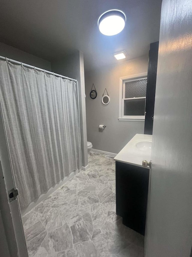 25290 Foothill Ave, Tomah, WI 54660 - full bathroom featuring toilet, a shower with shower curtain, and vanity