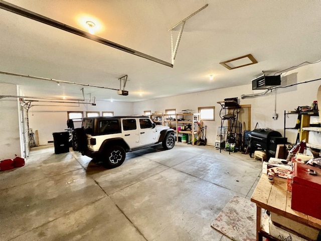 garage featuring a garage door opener