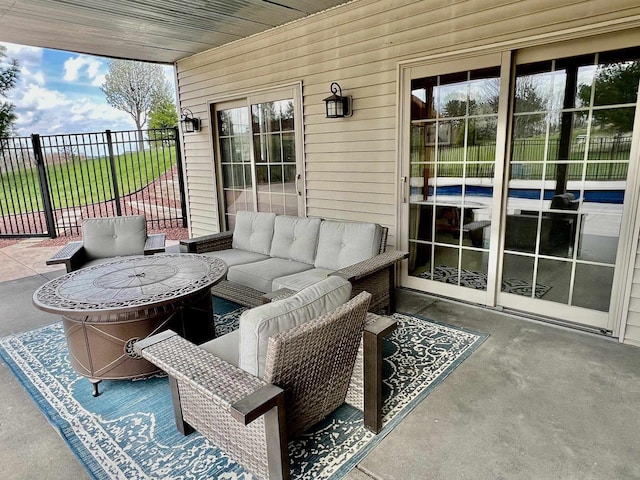 view of patio / terrace with fence and outdoor lounge area
