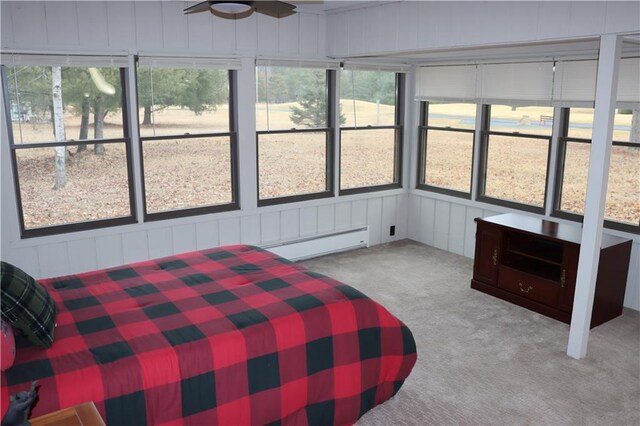28942 Spring Green Way, Danbury, WI 54830 - sunroom featuring plenty of natural light, a baseboard heating unit, and a ceiling fan