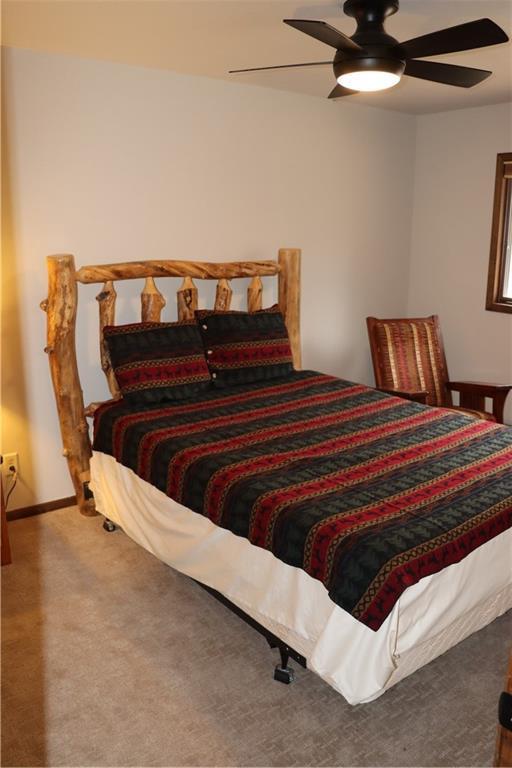 28942 Spring Green Way, Danbury, WI 54830 - bedroom featuring carpet and a ceiling fan