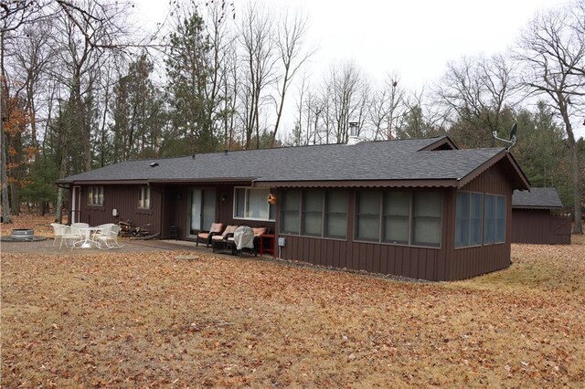 28942 Spring Green Way, Danbury, WI 54830 - rear view of property with a shingled roof and a patio