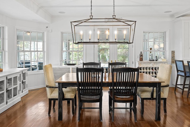 549 Illinois Ave, Green Lake, WI 54941 - dining room with crown molding, an inviting chandelier, and dark wood finished floors