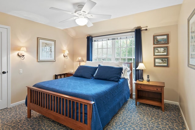 549 Illinois Ave, Green Lake, WI 54941 - bedroom featuring baseboards, a ceiling fan, carpet, and lofted ceiling