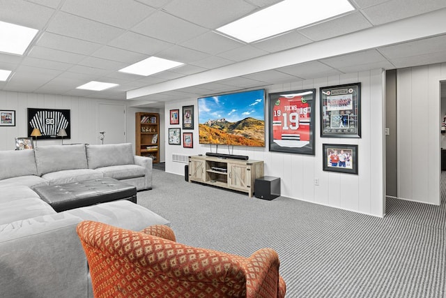 549 Illinois Ave, Green Lake, WI 54941 - living room featuring visible vents, a drop ceiling, and carpet