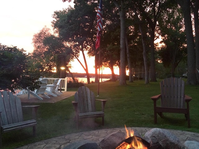 549 Illinois Ave, Green Lake, WI 54941 - view of yard with a patio area and a fire pit