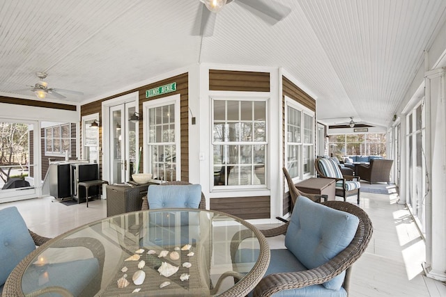 549 Illinois Ave, Green Lake, WI 54941 - sunroom featuring ceiling fan and outdoor dining area