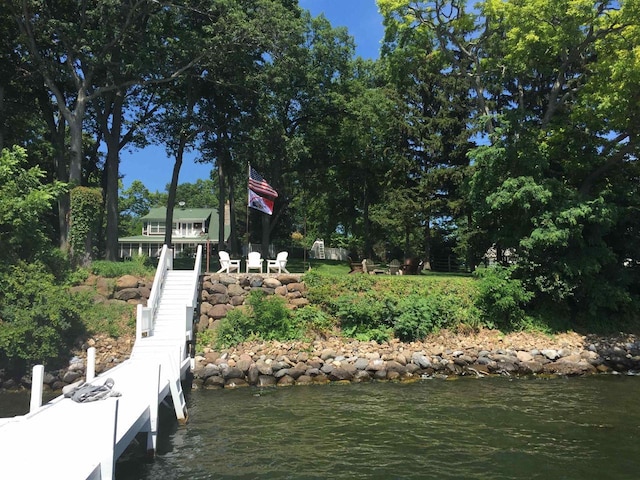 549 Illinois Ave, Green Lake, WI 54941 - view of dock featuring a water view