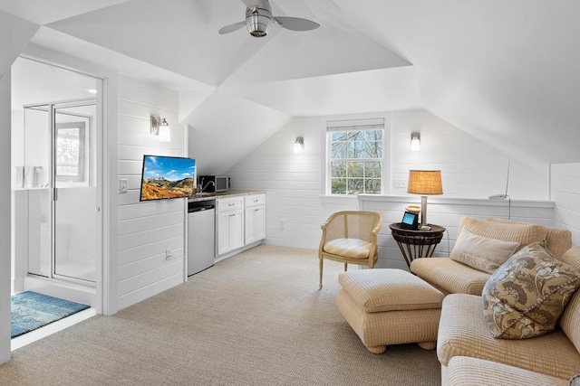 549 Illinois Ave, Green Lake, WI 54941 - sitting room with a ceiling fan, light colored carpet, and vaulted ceiling