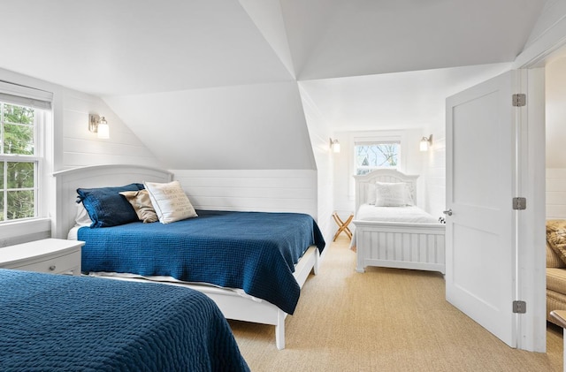 549 Illinois Ave, Green Lake, WI 54941 - bedroom with light carpet and vaulted ceiling