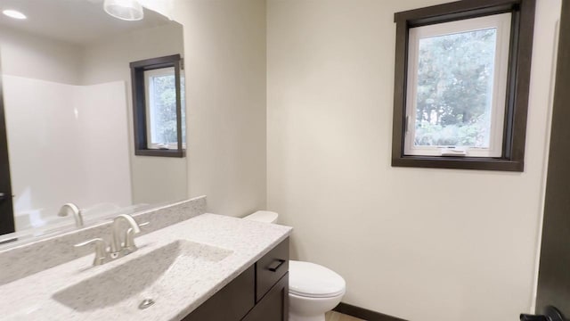 N1647 21st Ave, Wautoma, WI 54982 - bathroom featuring toilet and vanity