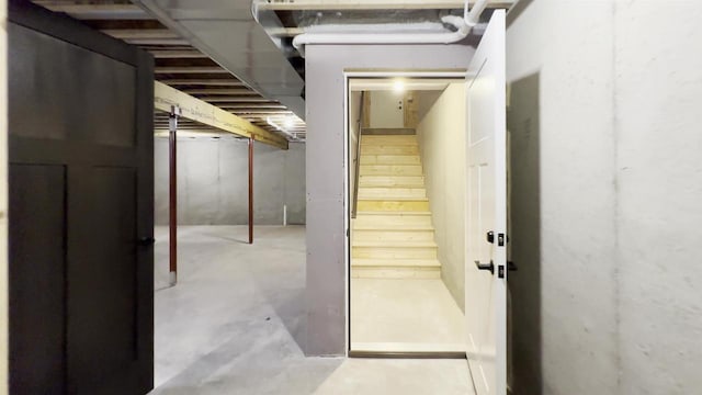 N1647 21st Ave, Wautoma, WI 54982 - staircase featuring unfinished concrete floors