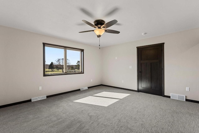 N1647 21st Ave, Wautoma, WI 54982 - carpeted empty room with baseboards, a ceiling fan, and visible vents