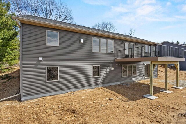 N1647 21st Ave, Wautoma, WI 54982 - rear view of property with a wooden deck and a shingled roof
