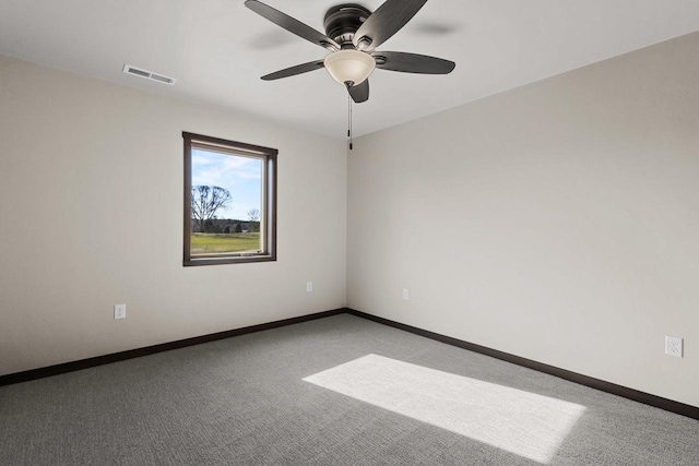 N1647 21st Ave, Wautoma, WI 54982 - unfurnished room with baseboards, a ceiling fan, visible vents, and light carpet