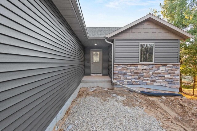 N1647 21st Ave, Wautoma, WI 54982 - property entrance featuring stone siding
