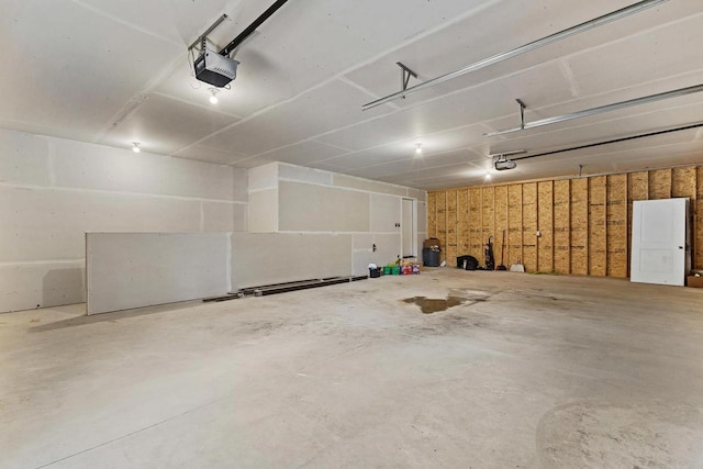 N1647 21st Ave, Wautoma, WI 54982 - garage featuring a garage door opener