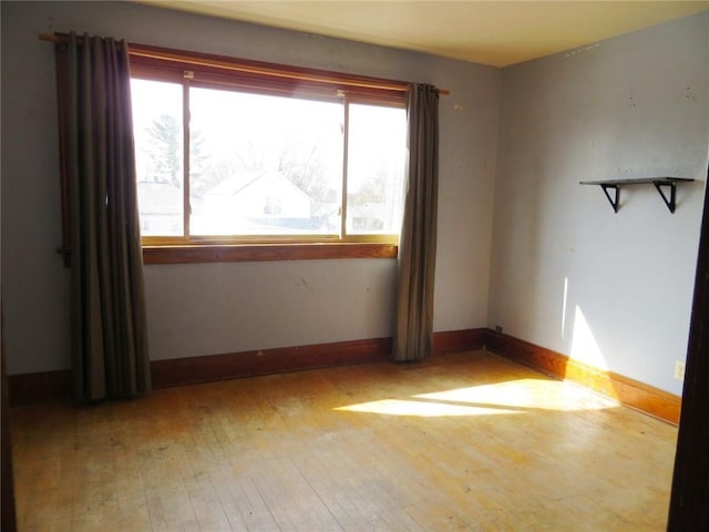 204 W Main St, Thorp, WI 54771 - spare room with baseboards and light wood-style floors