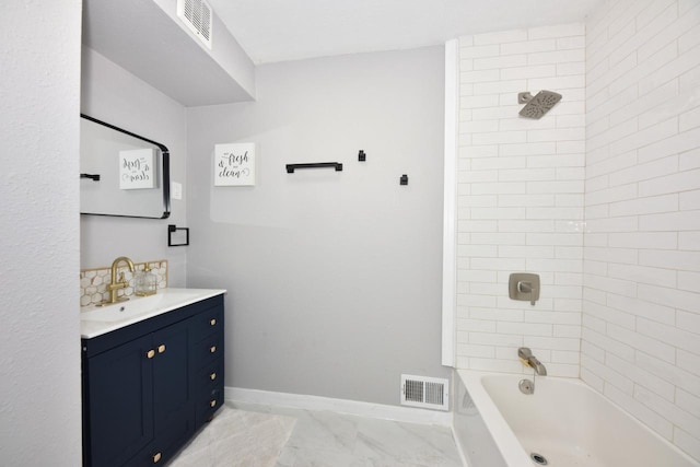 full bath with baseboards, marble finish floor, visible vents, and vanity
