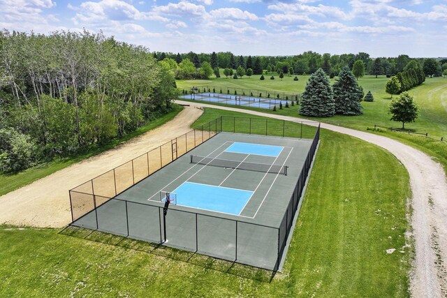 831 Sauganash Dr, Fontana, WI 53125 - view of tennis court featuring fence and a yard