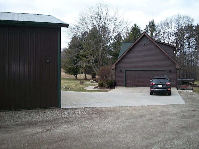 garage featuring driveway