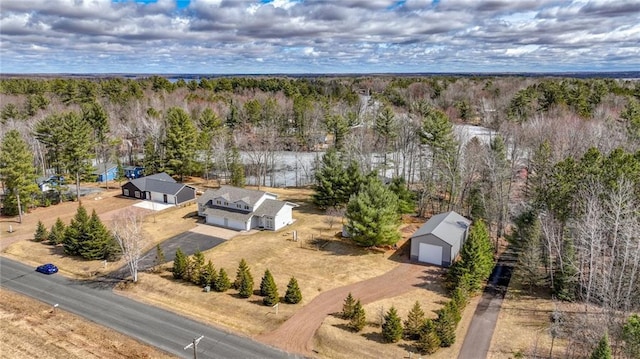27183 250th St, Holcombe, WI 54745 - drone / aerial view with a wooded view