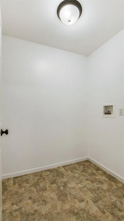 27183 250th St, Holcombe, WI 54745 - spare room featuring baseboards