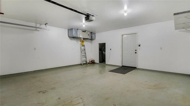 27183 250th St, Holcombe, WI 54745 - garage featuring a garage door opener