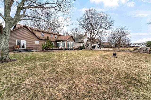 2015 Hickory Ln, Oshkosh, WI 54901 - view of yard featuring a wooden deck