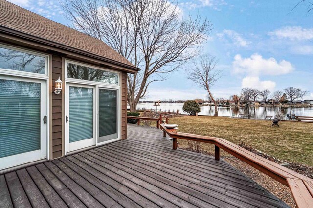 2015 Hickory Ln, Oshkosh, WI 54901 - wooden terrace with a water view and a lawn