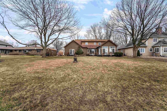 2015 Hickory Ln, Oshkosh, WI 54901 - view of yard with a wooden deck