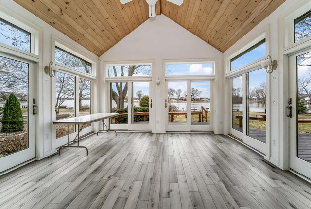 2015 Hickory Ln, Oshkosh, WI 54901 - unfurnished sunroom featuring wood ceiling, wood finished floors, high vaulted ceiling, and plenty of natural light