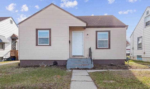 4348 N 30th St, Milwaukee, WI 53216 - bungalow-style home featuring a front lawn and roof with shingles