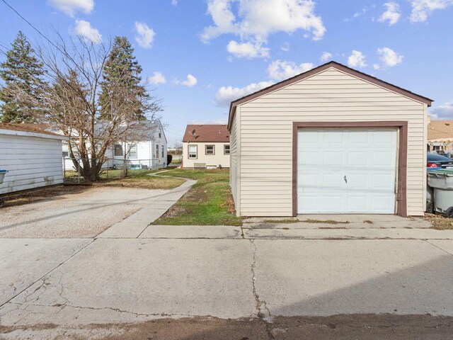 4348 N 30th St, Milwaukee, WI 53216 - detached garage featuring fence and concrete driveway
