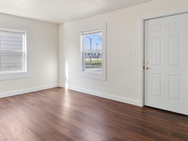 4348 N 30th St, Milwaukee, WI 53216 - unfurnished room featuring dark wood-style floors and baseboards