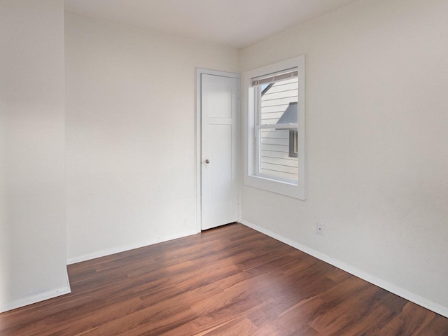 4348 N 30th St, Milwaukee, WI 53216 - empty room featuring baseboards and wood finished floors