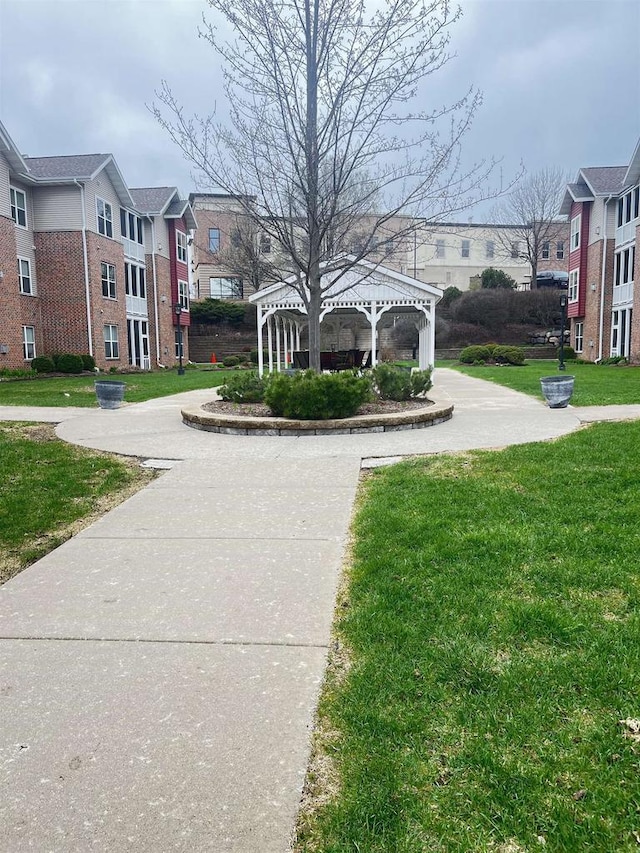 200 Femrite Dr Unit 211, Monona, WI 53716 - view of home's community featuring a gazebo, a lawn, and a residential view