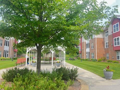 200 Femrite Dr Unit 211, Monona, WI 53716 - view of community with a yard