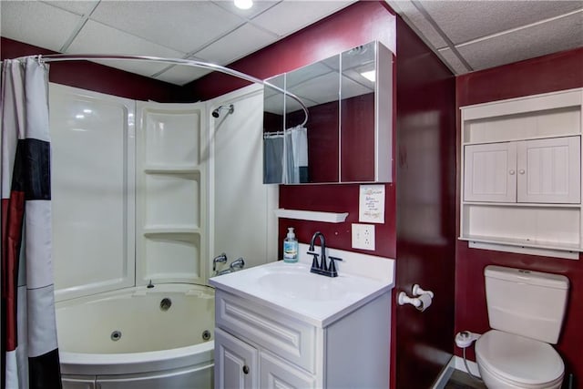W1797 County Road A, Mindoro, WI 54644 - full bathroom with toilet, a combined bath / shower with jetted tub, a drop ceiling, and vanity