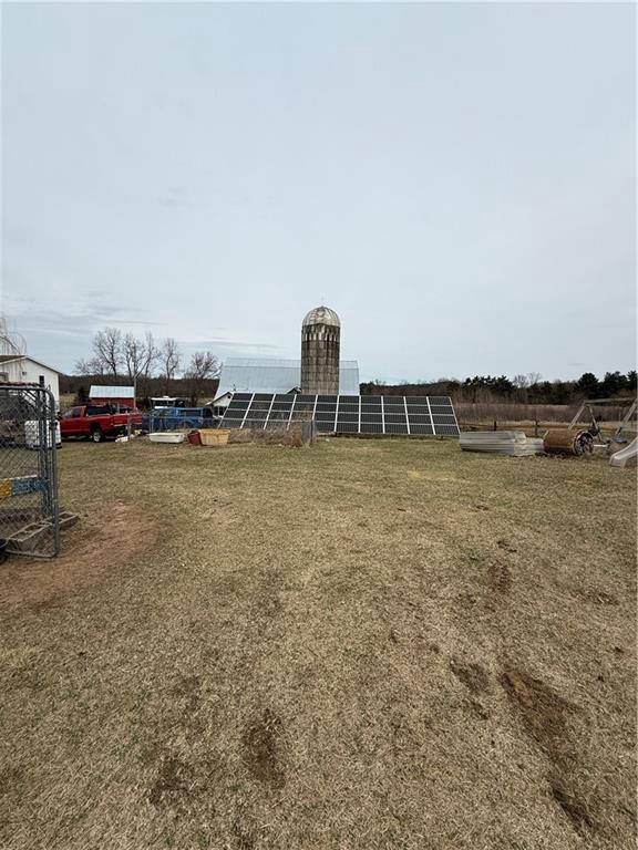 W1797 County Road A, Mindoro, WI 54644 - view of yard with fence